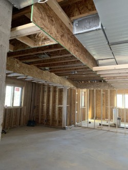Wooden framework and ventilation in new home under construction