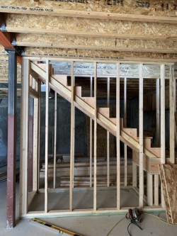 Framework for interior walls and staircase in partially-built home
