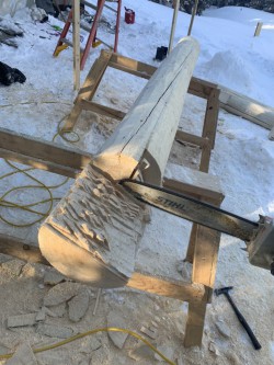 Partially sawed wooden beam
