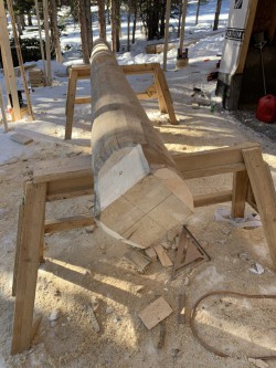 Partially sawed wooden beam