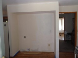 Empty kitchen space before remodel and appliance installation