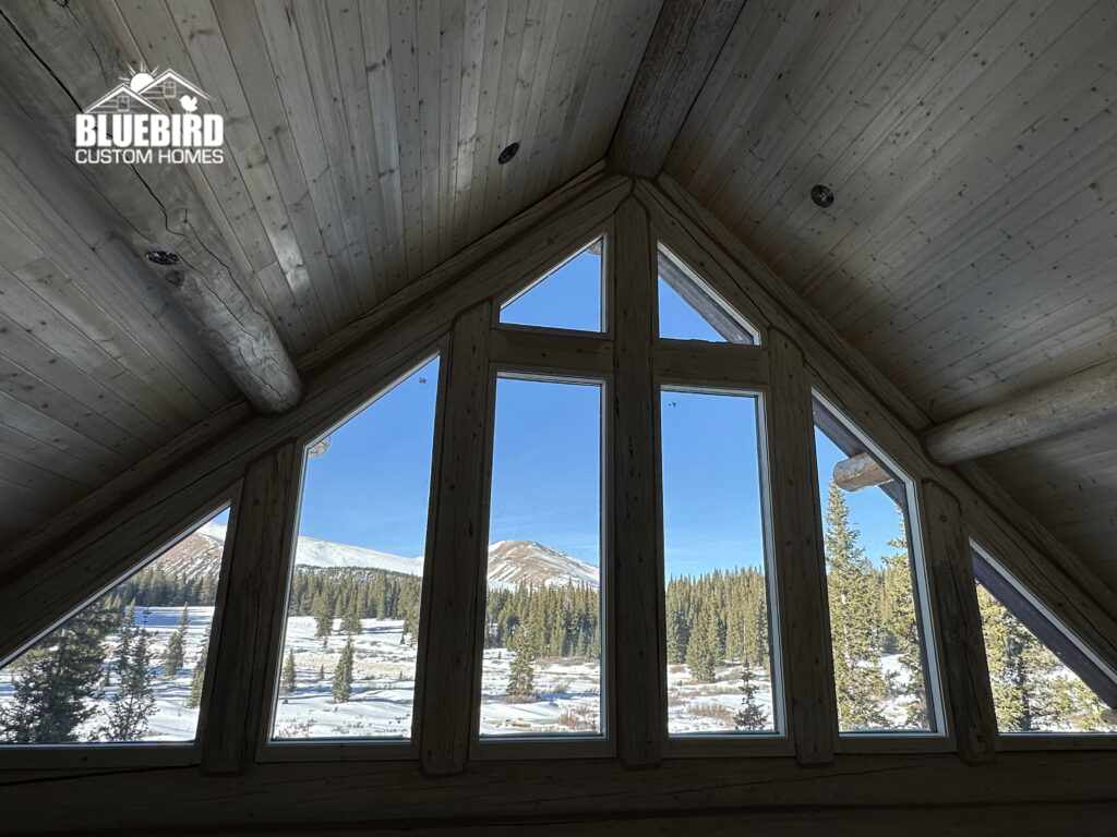 large great room windows in custom wood home